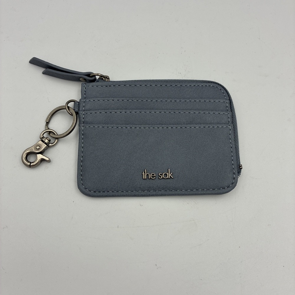 The SAK Iris gray leather card ID wallet zip around closure